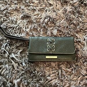 Black with silver details and lacing wristlet good condition